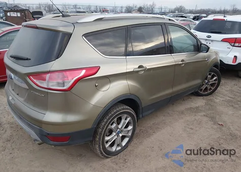2014 Ford Escape Titanium z USA, uszkodzony, nr VIN 1FMCU9J91EUA07411